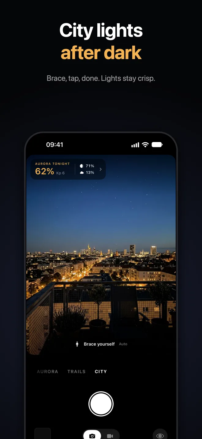City preset photographing a skyline at night from a rooftop terrace